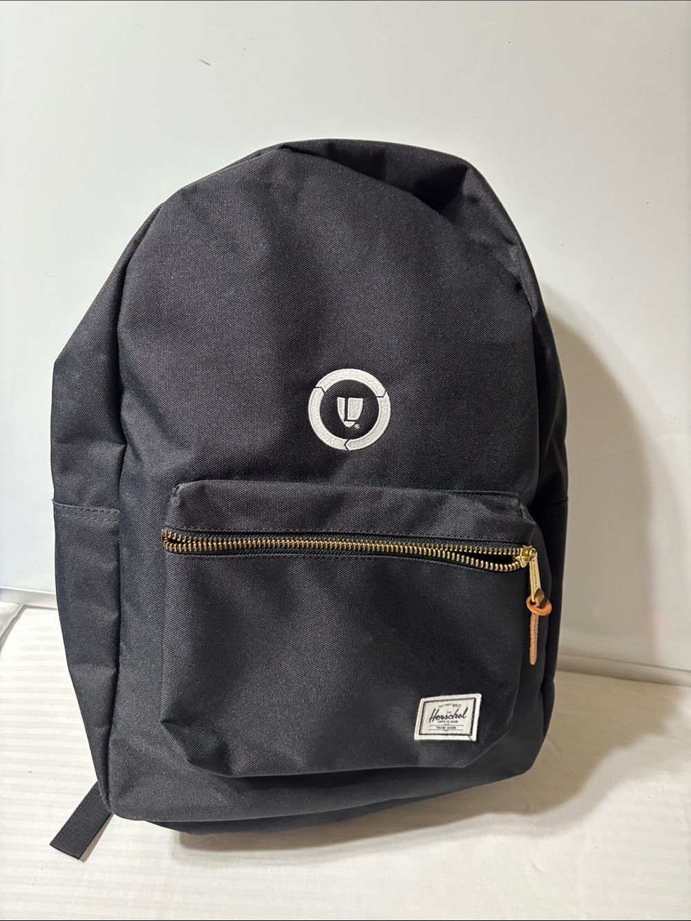 Herschel Supply Company Black Backpack with Brass Zipper and Tan Pull. NWOT